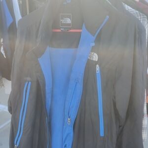 The North Face Men's Black Jacket with Blue Accents